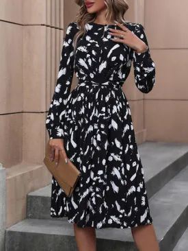 Corrie Cosmo Long Sleeve Midi Dress in Black and White